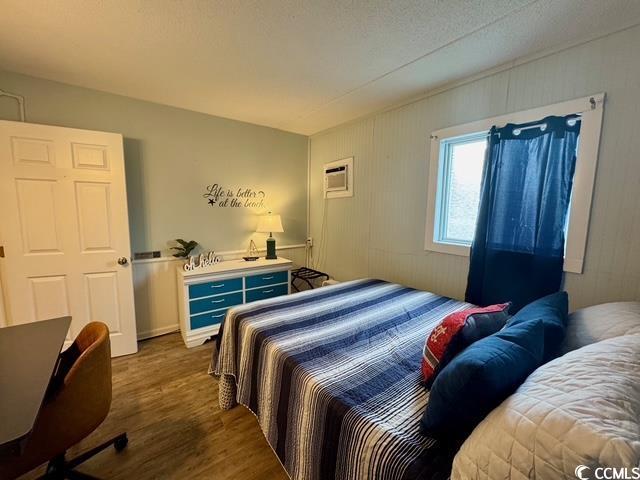 5409 N Ocean Blvd Unit 111, North Myrtle Beach, SC 29582 - bedroom with wood finished floors