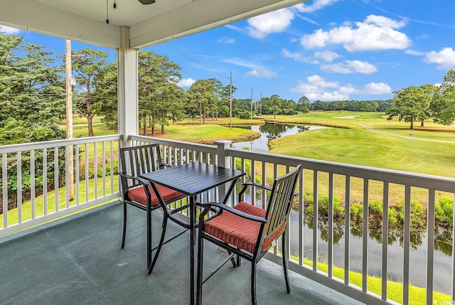 4811 Orchid Way Unit 301, Myrtle Beach, SC 29577 - balcony with ceiling fan, golf course view, a water view, and view of scattered trees
