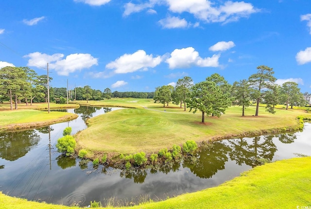 4811 Orchid Way Unit 301, Myrtle Beach, SC 29577 - surrounding community featuring a water view, view of golf course, a yard, and view of wooded area