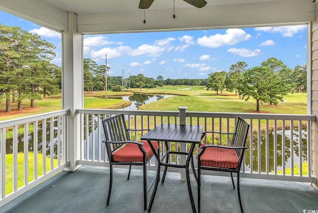 4811 Orchid Way Unit 301, Myrtle Beach, SC 29577 - balcony featuring a ceiling fan, view of golf course, a water view, and view of scattered trees