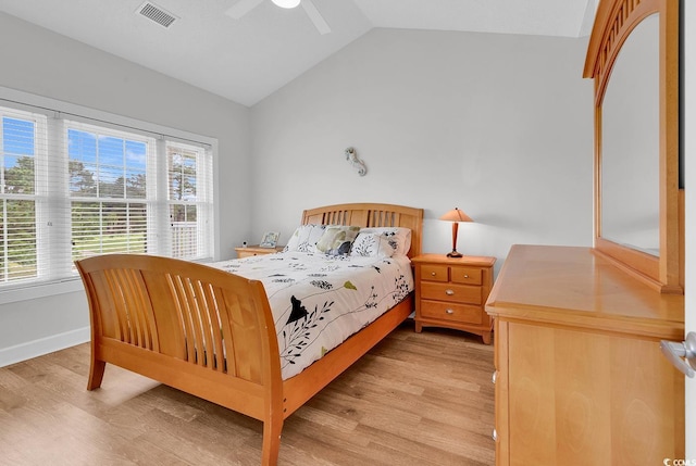 4811 Orchid Way Unit 301, Myrtle Beach, SC 29577 - bedroom with vaulted ceiling, light wood finished floors, multiple windows, and ceiling fan
