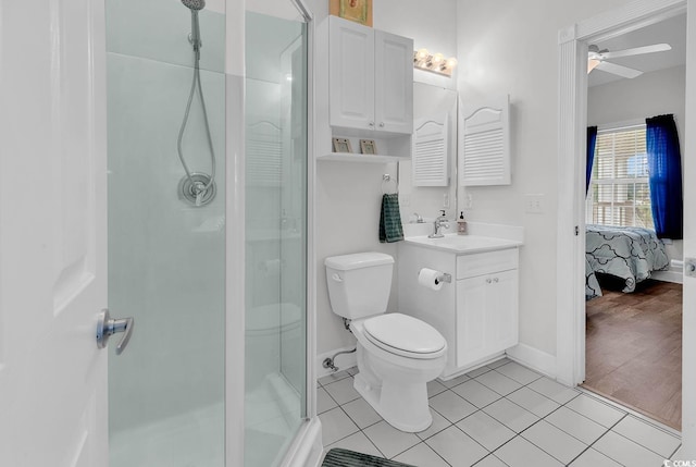 4811 Orchid Way Unit 301, Myrtle Beach, SC 29577 - ensuite bathroom featuring a shower stall, vanity, a ceiling fan, and tile patterned floors