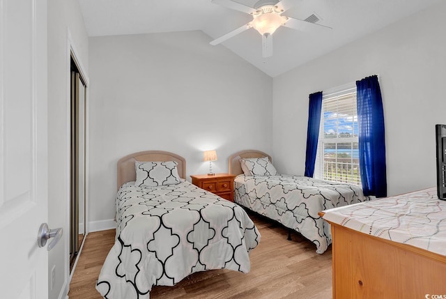 4811 Orchid Way Unit 301, Myrtle Beach, SC 29577 - bedroom with vaulted ceiling, light wood finished floors, a closet, and a ceiling fan