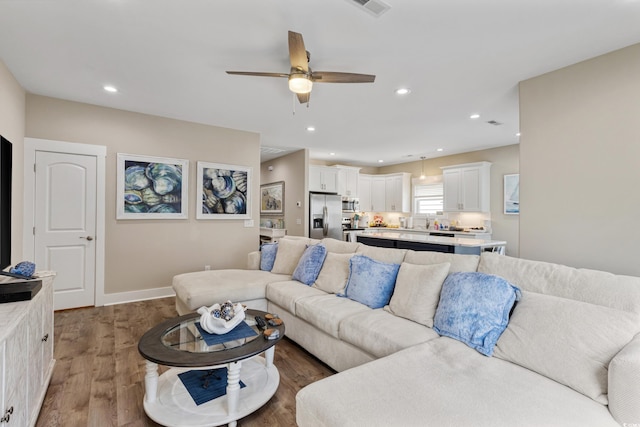 141 Marblehead Dr, Little River, SC 29566 - living room featuring ceiling fan, wood finished floors, recessed lighting, and baseboards