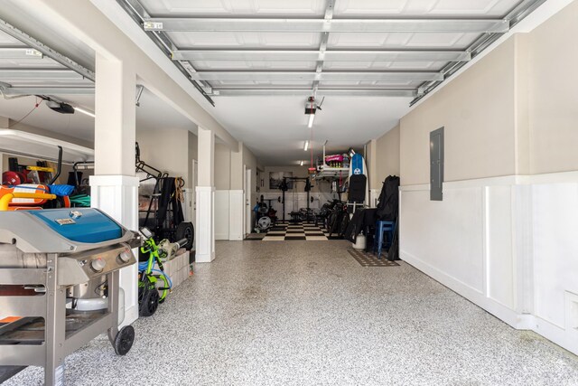 141 Marblehead Dr, Little River, SC 29566 - garage featuring electric panel and wainscoting