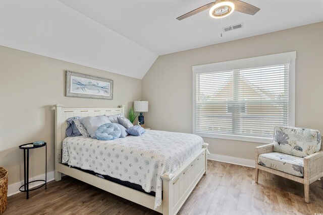 141 Marblehead Dr, Little River, SC 29566 - bedroom featuring wood finished floors, vaulted ceiling, baseboards, and ceiling fan