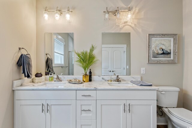 141 Marblehead Dr, Little River, SC 29566 - full bathroom with double vanity and toilet