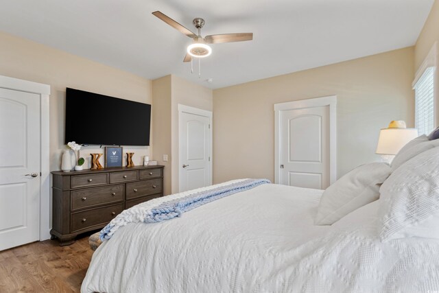 141 Marblehead Dr, Little River, SC 29566 - bedroom featuring wood finished floors and a ceiling fan