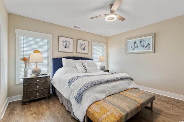 141 Marblehead Dr, Little River, SC 29566 - bedroom with baseboards, light wood-style flooring, and a ceiling fan