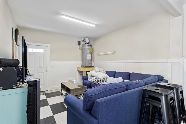 141 Marblehead Dr, Little River, SC 29566 - living area with water heater, tile patterned floors, and wainscoting