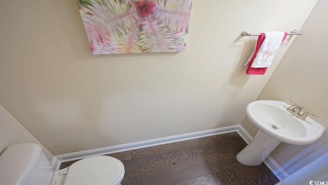 744 Choctaw Dr, Conway, SC 29526 - half bath featuring baseboards and toilet