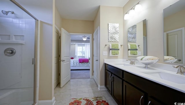744 Choctaw Dr, Conway, SC 29526 - ensuite bathroom featuring a shower stall, double vanity, ceiling fan, and baseboards