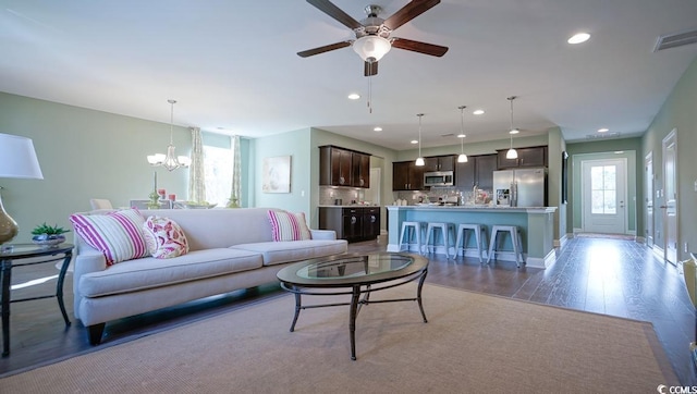 744 Choctaw Dr, Conway, SC 29526 - living room with a chandelier, a ceiling fan, wood finished floors, recessed lighting, and baseboards