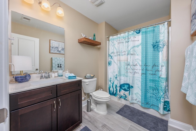 5475 Elba Way Unit 1601, Myrtle Beach, SC 29579 - bathroom featuring vanity, wood finished floors, and shower / tub combo with curtain