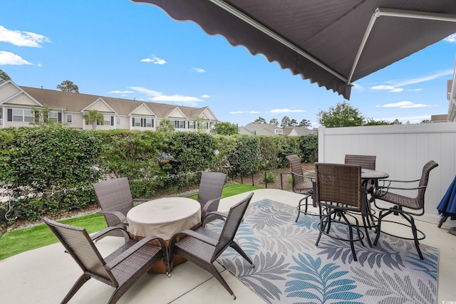 5475 Elba Way Unit 1601, Myrtle Beach, SC 29579 - view of patio / terrace featuring outdoor dining area and a residential view