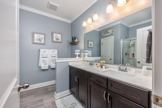 5475 Elba Way Unit 1601, Myrtle Beach, SC 29579 - full bathroom with double vanity, a shower stall, crown molding, and wood finished floors