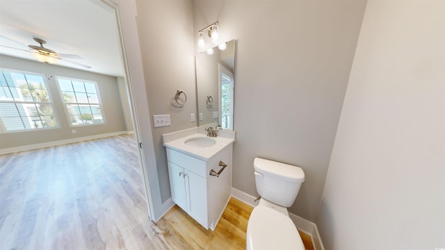 52 Fish Shack Aly, Murrells Inlet, SC 29576 - half bath with a ceiling fan, vanity, and wood finished floors