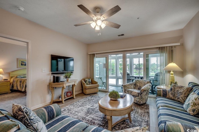 601 Hillside Dr N Unit 3704, North Myrtle Beach, SC 29582 - living area with a ceiling fan, baseboards, and wood finished floors