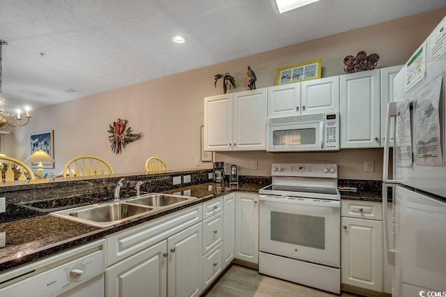 601 Hillside Dr N Unit 3704, North Myrtle Beach, SC 29582 - kitchen with white appliances, white cabinets, a chandelier, and recessed lighting