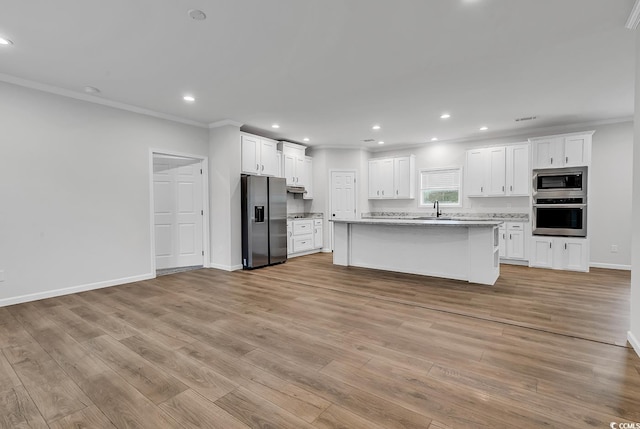 1529 Bucksport Rd, Conway, SC 29527 - kitchen with stainless steel appliances, crown molding, white cabinets, a sink, and open floor plan