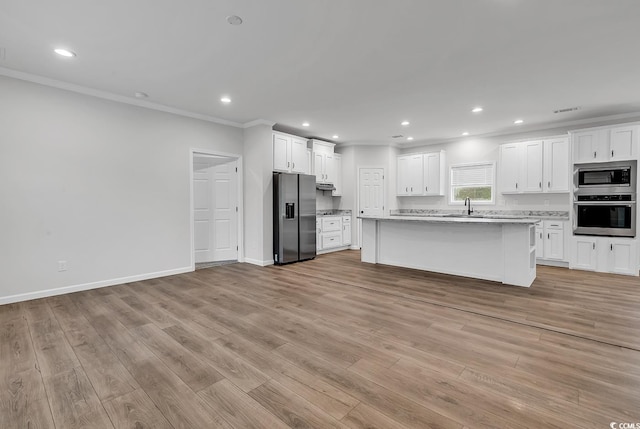 1529 Bucksport Rd, Conway, SC 29527 - kitchen featuring appliances with stainless steel finishes, ornamental molding, a sink, recessed lighting, and white cabinetry