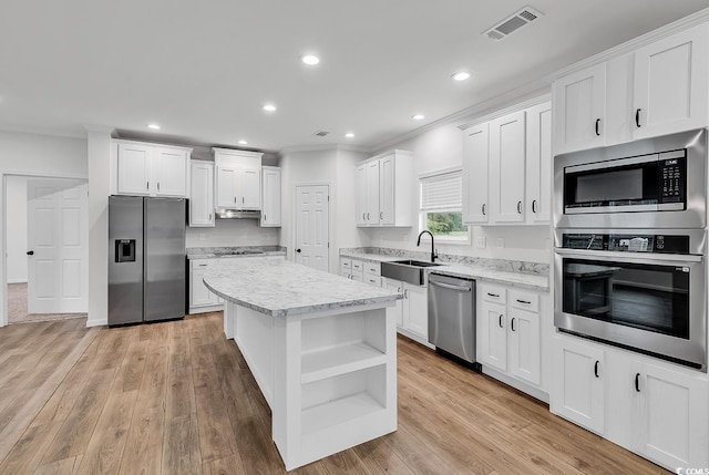 1529 Bucksport Rd, Conway, SC 29527 - kitchen featuring appliances with stainless steel finishes, a sink, open shelves, white cabinetry, and recessed lighting