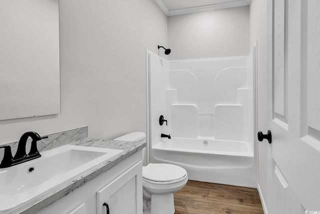 1529 Bucksport Rd, Conway, SC 29527 - full bathroom featuring vanity, wood finished floors, crown molding, toilet, and washtub / shower combination