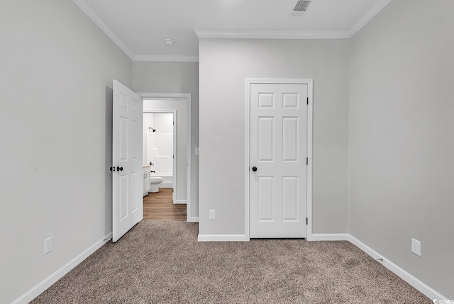 1529 Bucksport Rd, Conway, SC 29527 - unfurnished bedroom with crown molding, carpet flooring, and baseboards