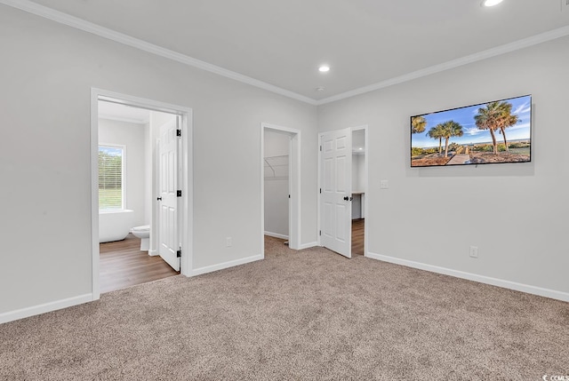 1529 Bucksport Rd, Conway, SC 29527 - unfurnished bedroom featuring carpet flooring, baseboards, ornamental molding, a spacious closet, and recessed lighting