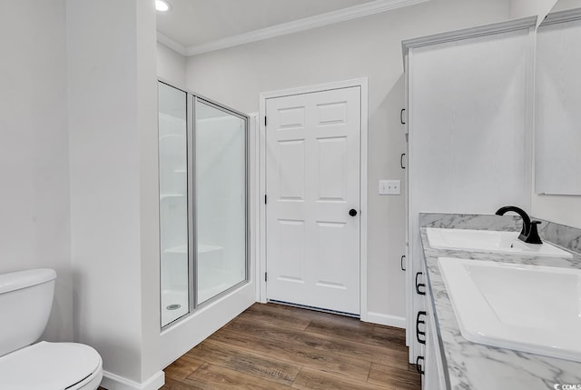 1529 Bucksport Rd, Conway, SC 29527 - full bath featuring crown molding, a stall shower, toilet, double vanity, and wood finished floors