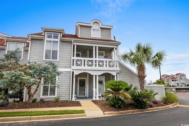 4396 Baldwin Ave Unit 30, Little River, SC 29566 - view of front facade with a balcony and a porch