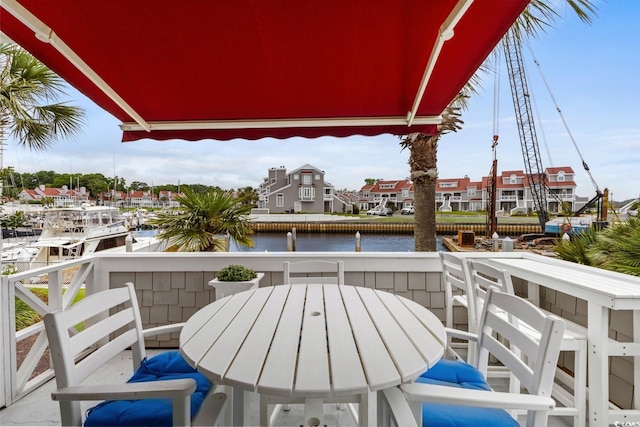 4396 Baldwin Ave Unit 30, Little River, SC 29566 - balcony with a water view and outdoor dining space