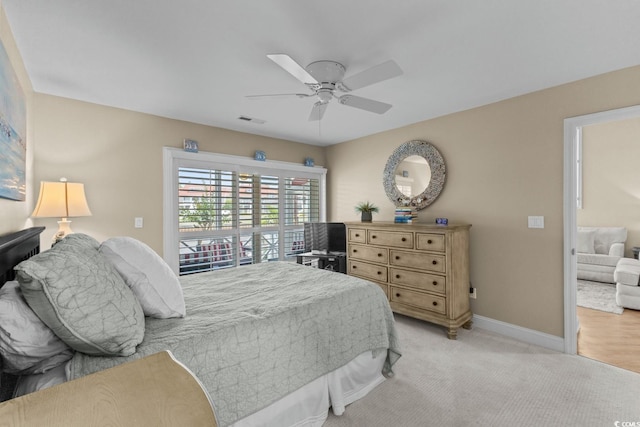 4396 Baldwin Ave Unit 30, Little River, SC 29566 - bedroom featuring baseboards, light carpet, and ceiling fan