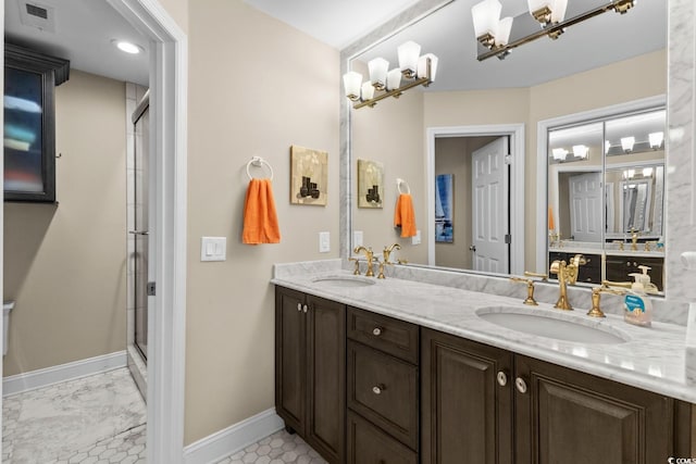 4396 Baldwin Ave Unit 30, Little River, SC 29566 - full bathroom with baseboards, double vanity, and a stall shower