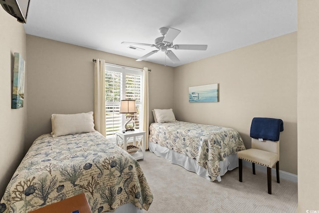 4396 Baldwin Ave Unit 30, Little River, SC 29566 - carpeted bedroom with a ceiling fan and baseboards