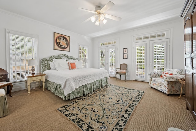 214 Sea Island Dr, Georgetown, SC 29440 - bedroom featuring light colored carpet, ornamental molding, access to outside, multiple windows, and ceiling fan