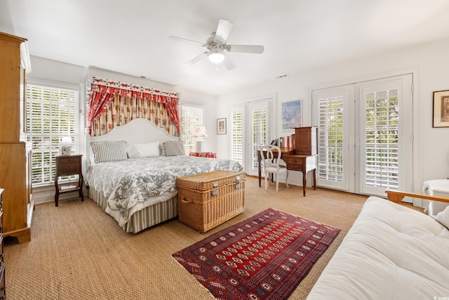 214 Sea Island Dr, Georgetown, SC 29440 - bedroom featuring access to exterior, light carpet, and ceiling fan