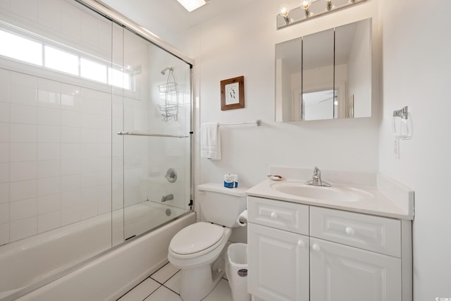 214 Sea Island Dr, Georgetown, SC 29440 - bathroom with vanity, toilet, combined bath / shower with glass door, and tile patterned flooring