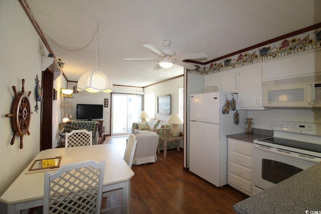1582 S Waccamaw Dr Unit 56, Garden City Beach, SC 29576 - kitchen featuring white appliances, dark wood-style floors, open floor plan, white cabinetry, and ceiling fan