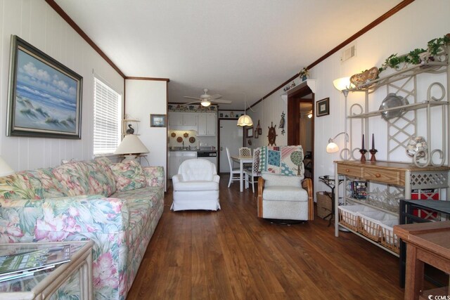 1582 S Waccamaw Dr Unit 56, Garden City Beach, SC 29576 - living area with crown molding, wood finished floors, and ceiling fan