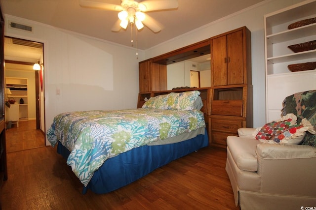 1582 S Waccamaw Dr Unit 56, Garden City Beach, SC 29576 - bedroom featuring wood finished floors, ornamental molding, and ceiling fan