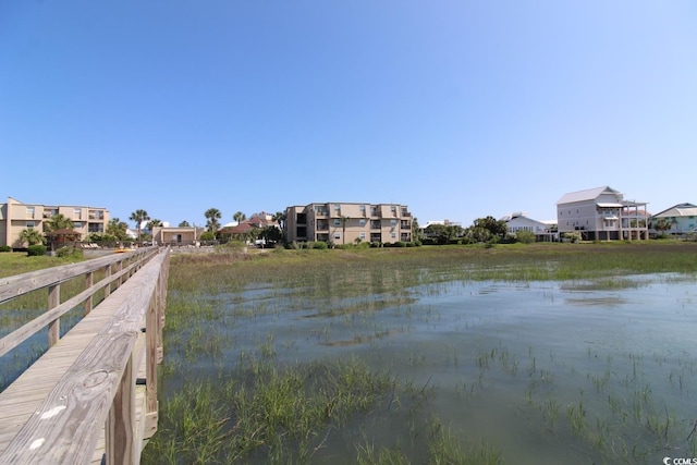 1582 S Waccamaw Dr Unit 56, Garden City Beach, SC 29576 - dock area with a water view and a residential view