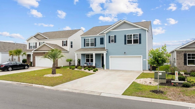 3573 Bells Lake Cir, Longs, SC 29568 - view of front facade featuring driveway, a front lawn, and an attached garage