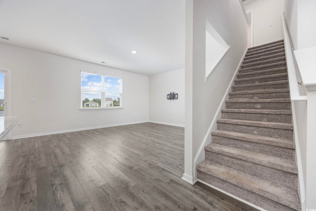 3573 Bells Lake Cir, Longs, SC 29568 - stairway with wood finished floors, baseboards, and recessed lighting