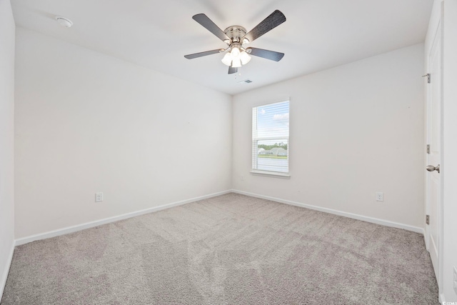 3573 Bells Lake Cir, Longs, SC 29568 - spare room with carpet, baseboards, ceiling fan, and a smoke detector