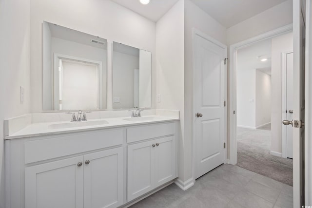 3573 Bells Lake Cir, Longs, SC 29568 - bathroom with double vanity and baseboards