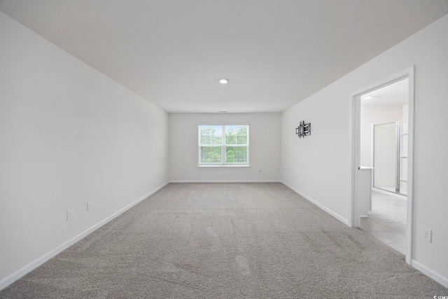 3573 Bells Lake Cir, Longs, SC 29568 - spare room featuring light colored carpet, baseboards, and recessed lighting
