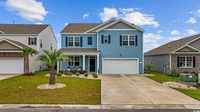 3573 Bells Lake Cir, Longs, SC 29568 - view of front of property featuring covered porch, a front lawn, an attached garage, and driveway