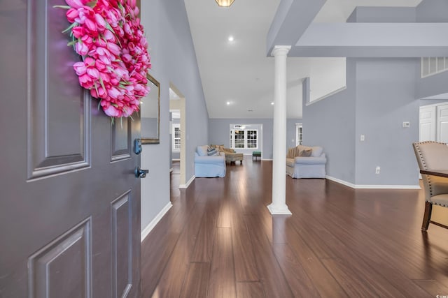 137 Maiden Ln, Myrtle Beach, SC 29588 - entryway with decorative columns, wood finished floors, baseboards, vaulted ceiling, and recessed lighting