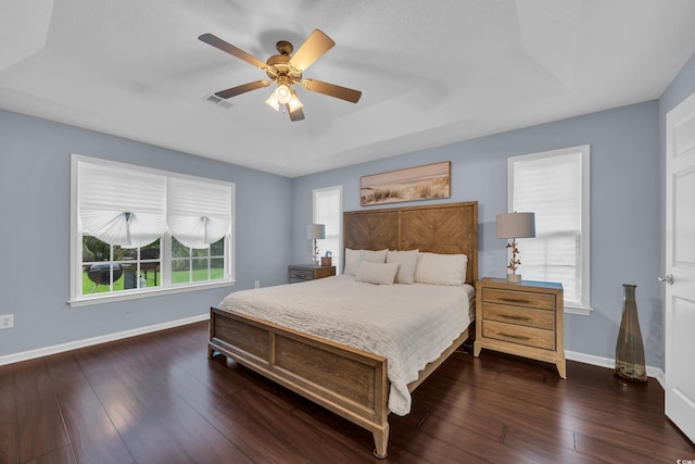 137 Maiden Ln, Myrtle Beach, SC 29588 - bedroom with baseboards, wood finished floors, and a ceiling fan